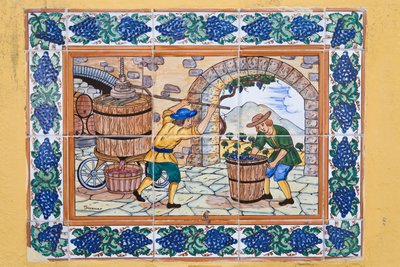 Modern Spanish Ceramic Tiles Showing Workers Operating Wine Press in Vineyard Cellar by Unknown